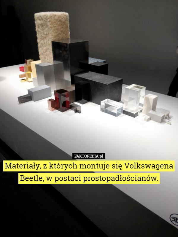 Materiały, z których montuje się Volkswagena Beetle, w postaci prostopadłościanów. 