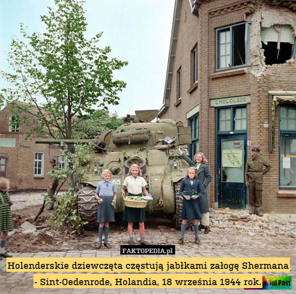 Holenderskie dziewczęta częstują jabłkami załogę Shermana - Sint-Oedenrode, Holandia, 18 września 1944 rok. 